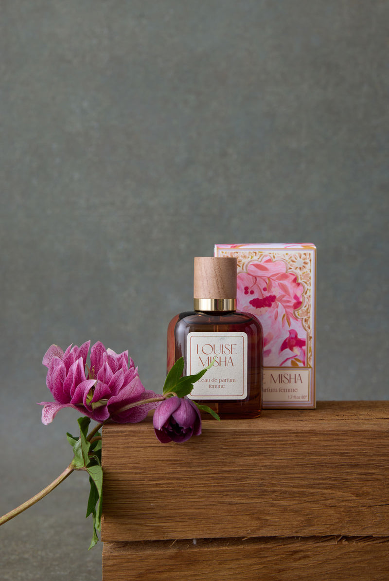 Lot de fête: Parfum Femme + Pochette