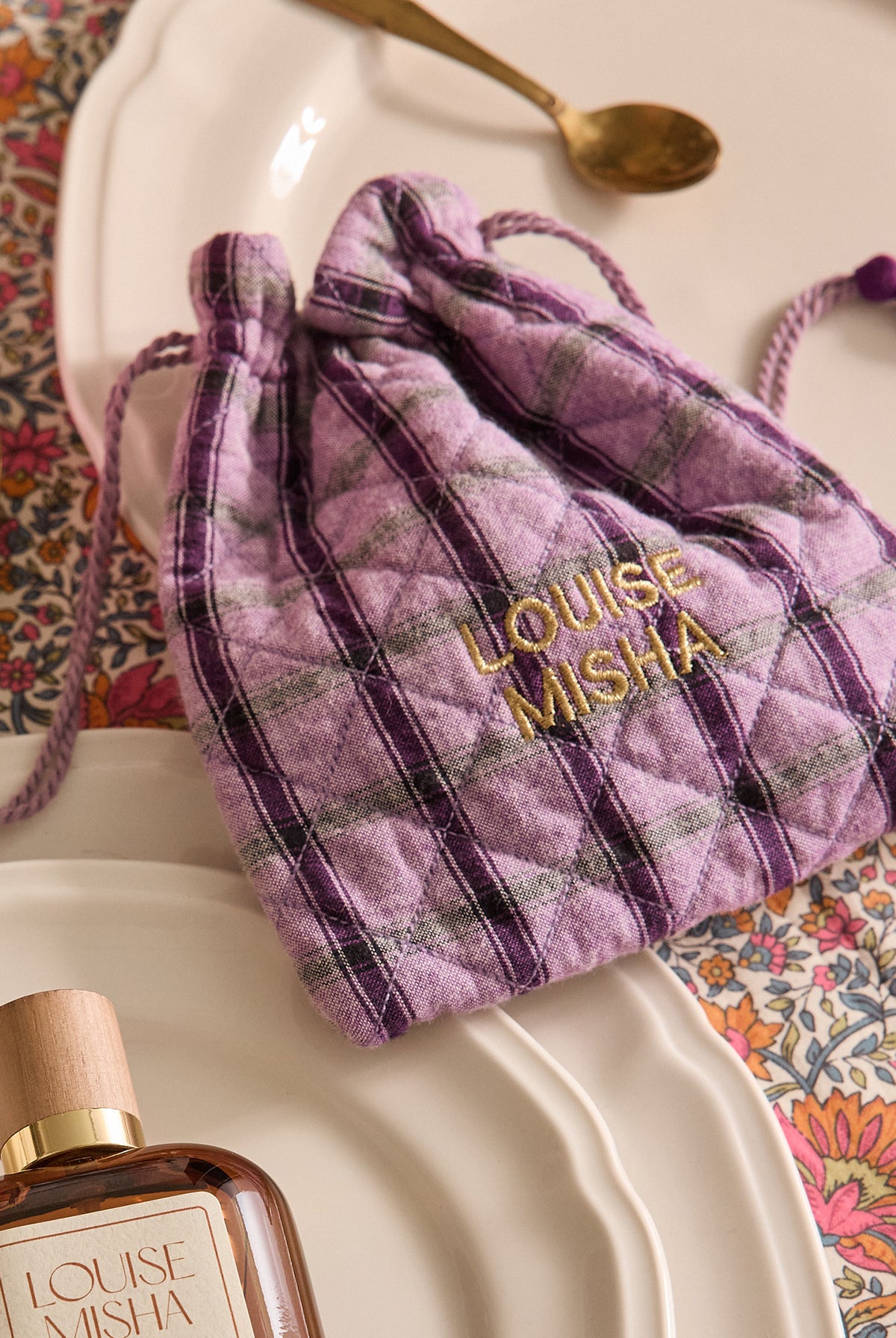 Lot de fête: Parfum Femme + Pochette